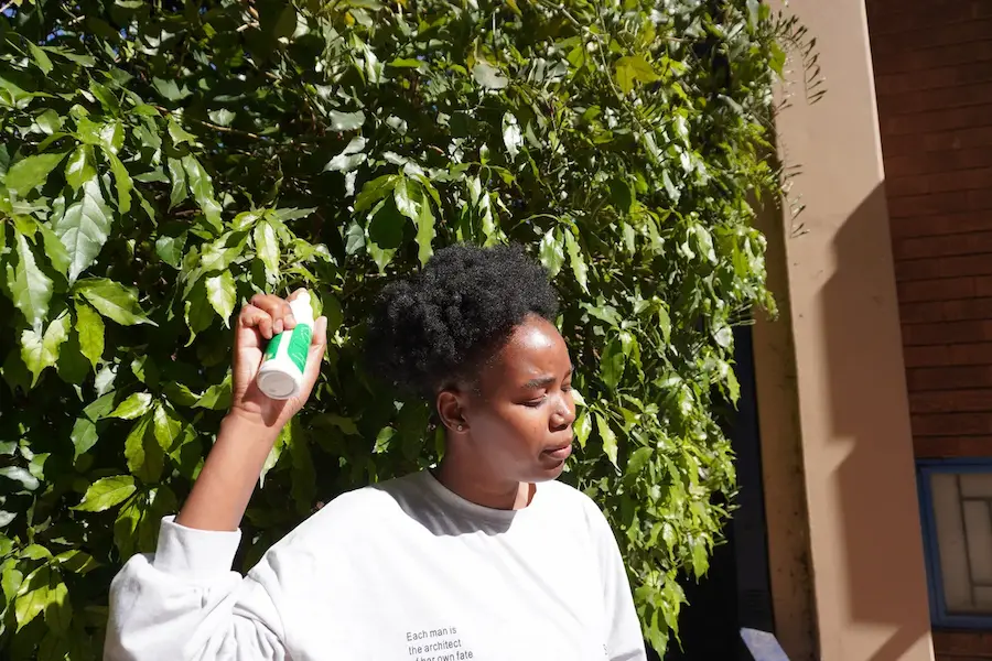Customer using Vitality Spray